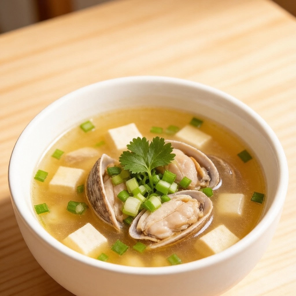 Clams and tofu in a clear broth
