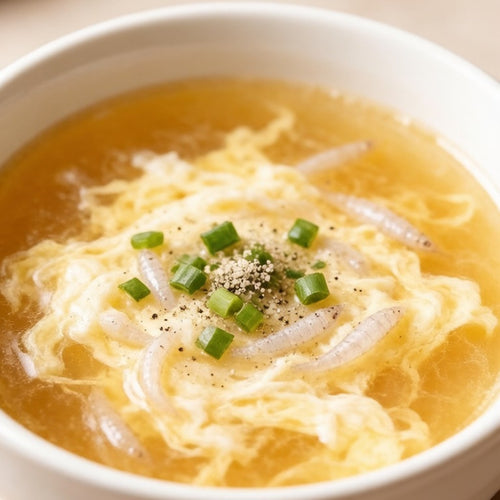 Clear egg-drop soup with whitebait